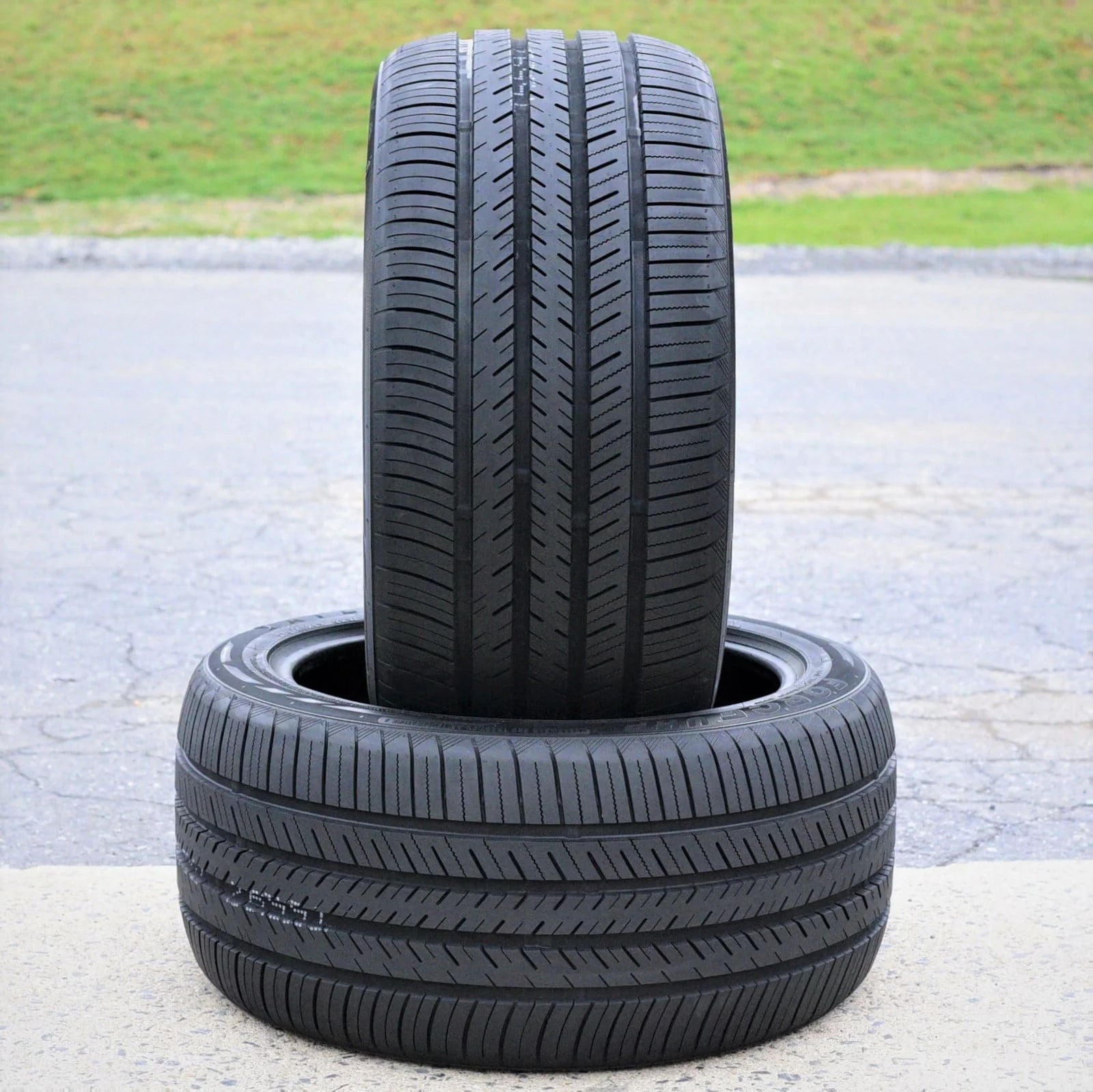 A pair of 2 (2) 255/40R20 101W XL A/S performance tires